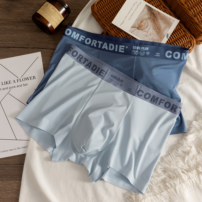 Hombre de alta gama algodón sin marcas pantalones interiores antibacterianos transpirables algodón entrepierna primavera y verano tendencia delgada juventud pantalones cortos de cuatro cuernos para chicos