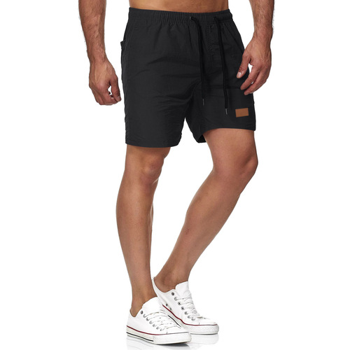 Men's all-matching five-minute quick-dry solid color leather label beach pants, sports fitness shorts