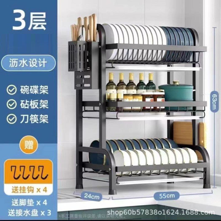 台所の物置棚の碗と箸の皿の水切りの収納棚の家庭用多機能の台の上に碗と箸の収納箱を置きます。|undefined