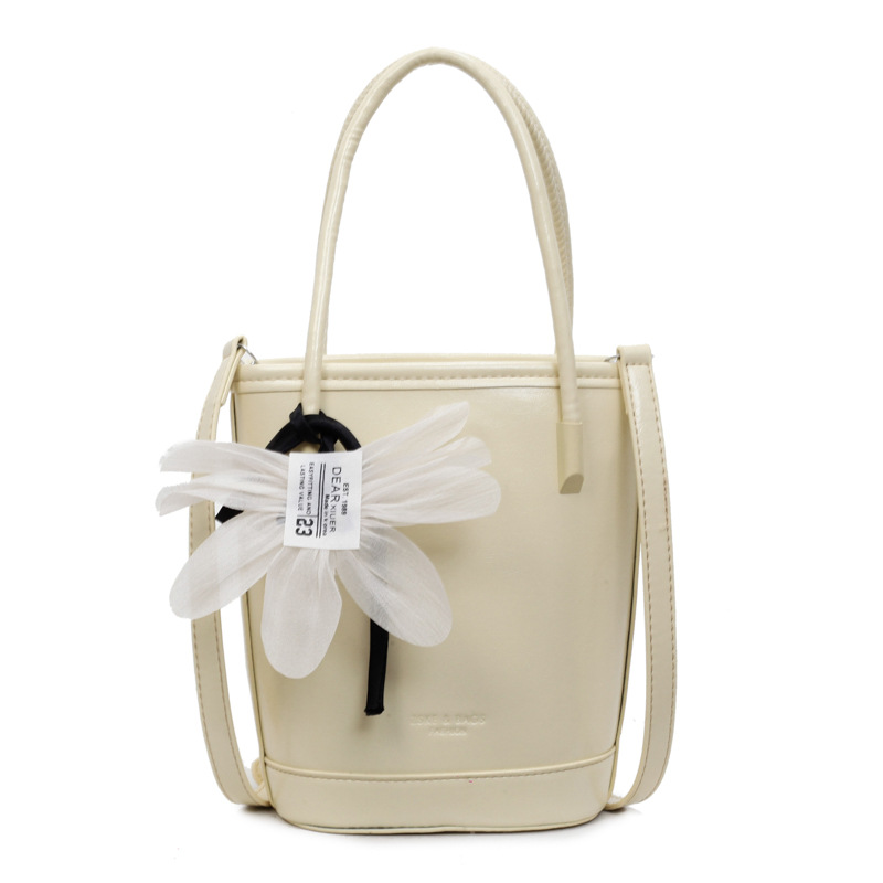 Bolso de moda personalizado bolso de cubo de textura de color sólido 2025 nuevo bolso de hombro de color sólido casual bolso de mensajero de cercanías