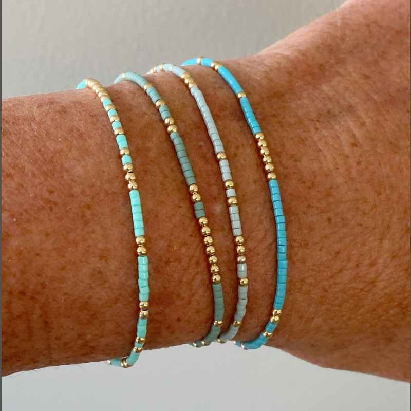 4-Piece Set of Fashionable and Simple Style Elastic Women's Bracelets with Rice Beads, Suitable for Commuting, Vacations, Parties, Cross-Border Jewelry