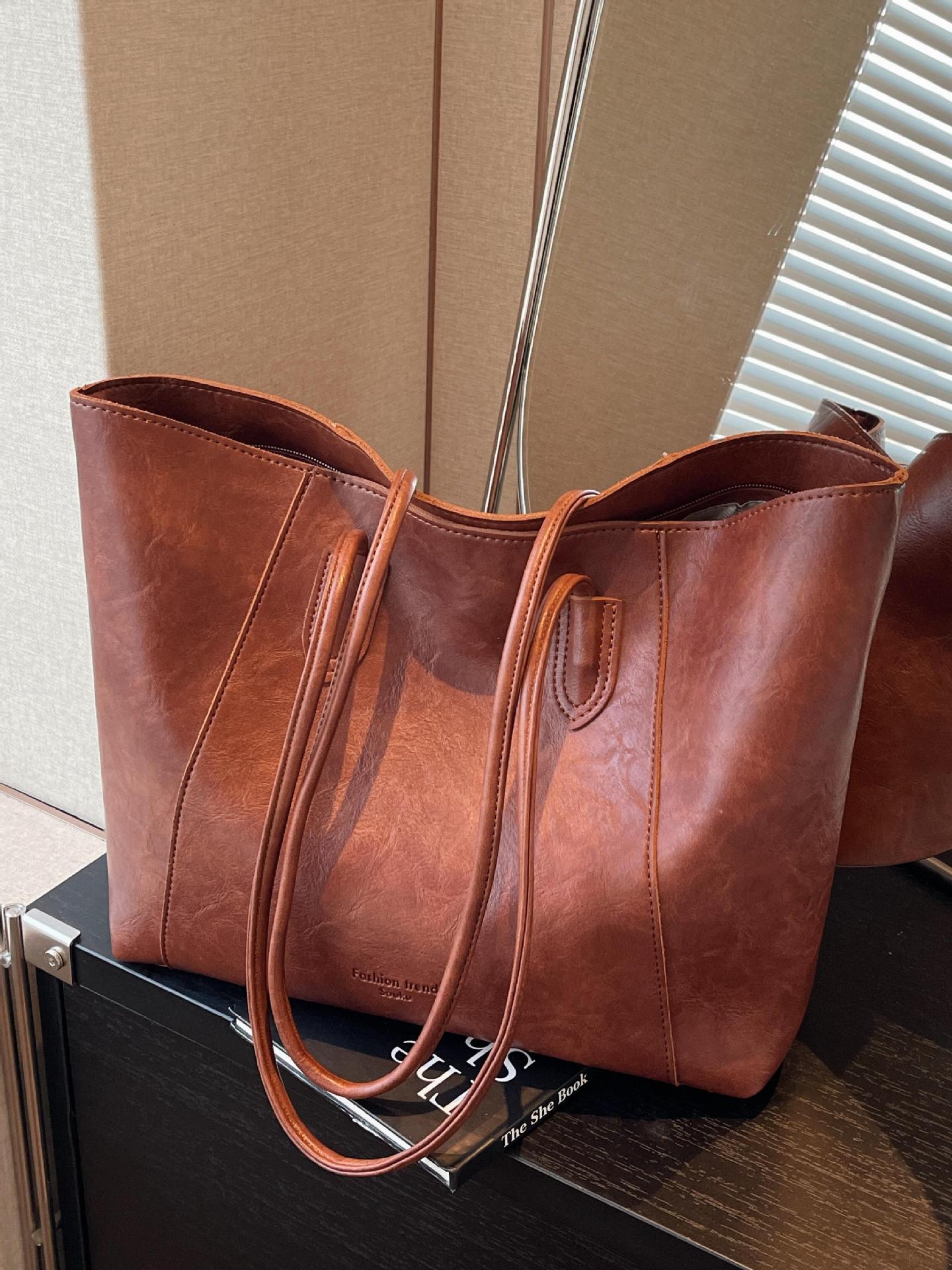 Bolsa de mano transfronteriza de gran capacidad para mujeres 2025 nueva bolsa de brazo portátil de viaje de alta calidad bolso de hombro casual