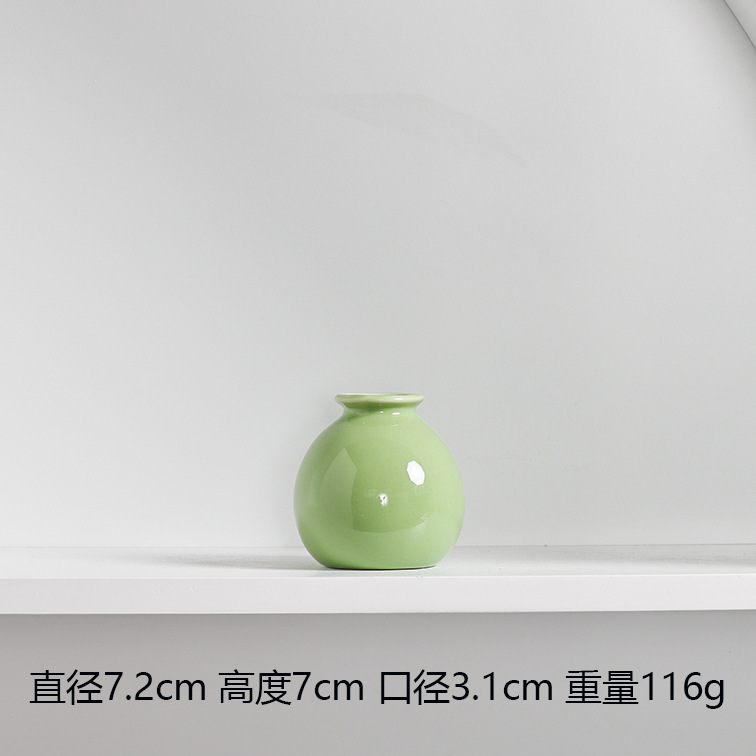 넓은 입 작은 둥근 병 녹색