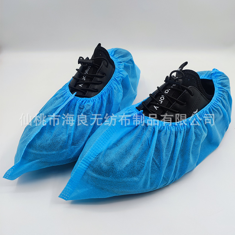Cubierta de zapato antideslizante no tejida desechable al por mayor a prueba de polvo transpirable engrosada cubierta de zapato no tejida cubierta de zapato impresa en negro