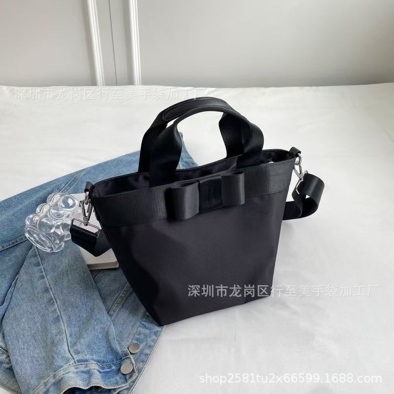 定制大容量手提简约牛津布收纳袋小蝴蝶结单肩学生韩版百搭斜挎包