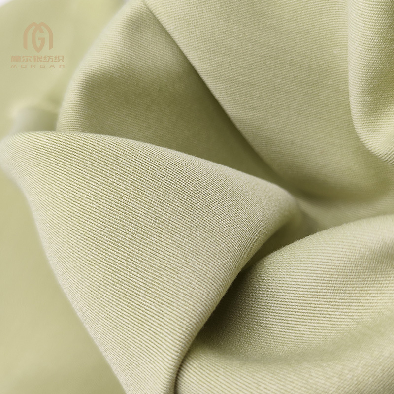 Tela Guangzhou TR poliéster algodón fino oblicuo llano primavera y otoño traje uniforme camisa pantalones de herramientas tela de rayón