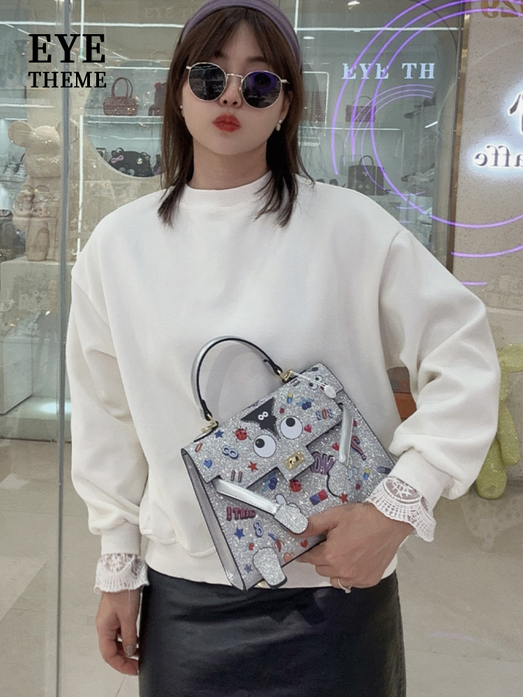 Personaje de dibujos animados para damas, nuevo bolso de solapa con forma peculiar, diseño de cerradura impresa, bolso diagonal de nicho