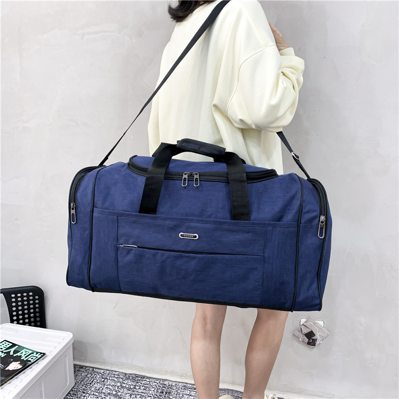 Bolsa de viaje de gran capacidad bolsa de equipaje bolsa de viaje de corta distancia húmeda y seca separación deportiva bolsa de fitness bolsa de avión al por mayor