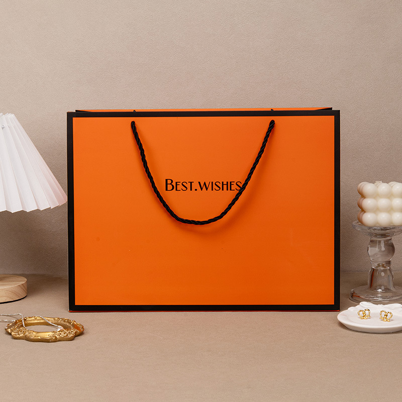 En stock naranja gran bolsa de regalo bolsa de embalaje cosmético ropa engrosada cartón blanco bolso de fábrica al por mayor