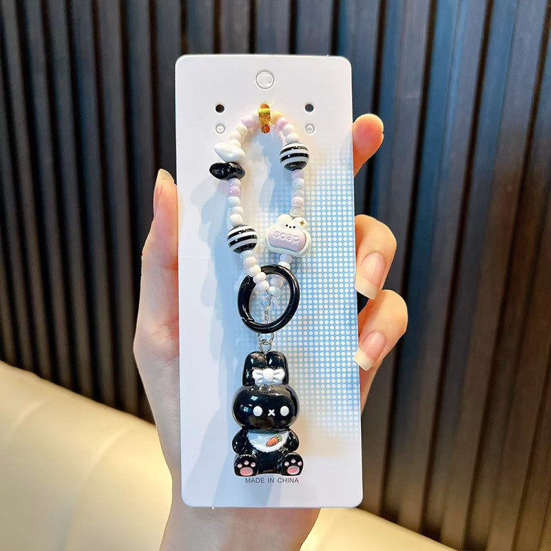 턱받이 흰 토끼-검정색