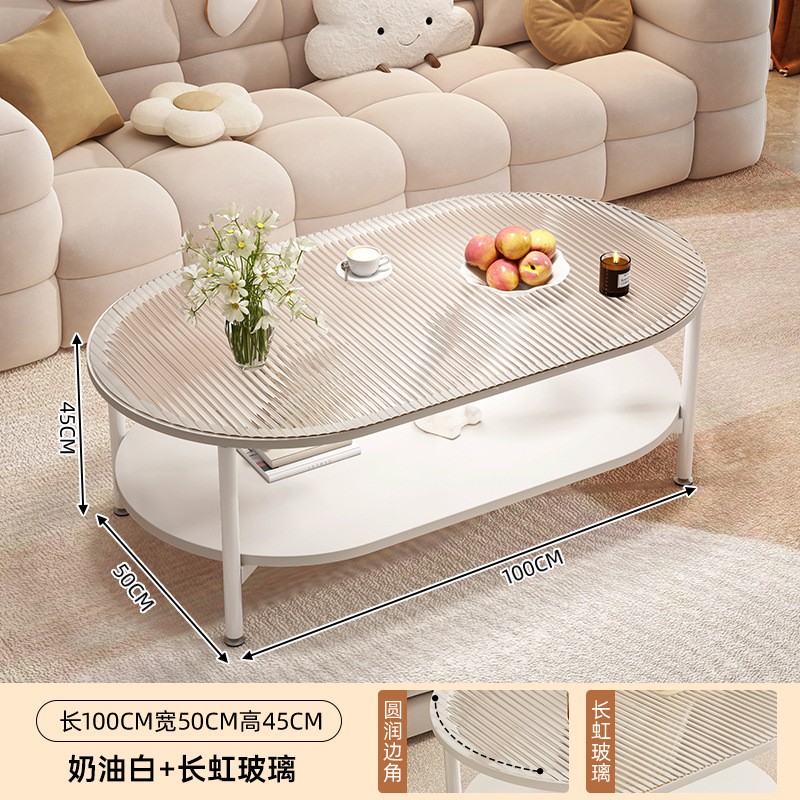 Mesa de té de vidrio sala de estar doméstica 2025 nueva mesa de lujo ligera y alta sensación de estilo crema de viento pequeño balcón mesa de té
