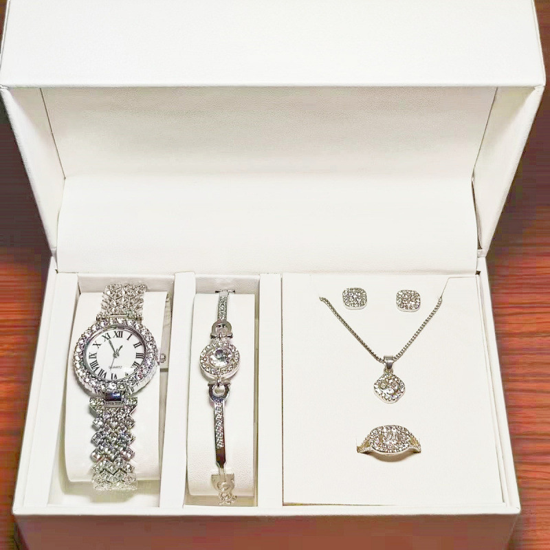 Серебряные римские часы + комплект из четырех предметов «Дыхание ребенка» (колье, кольцо, серьги и браслет)