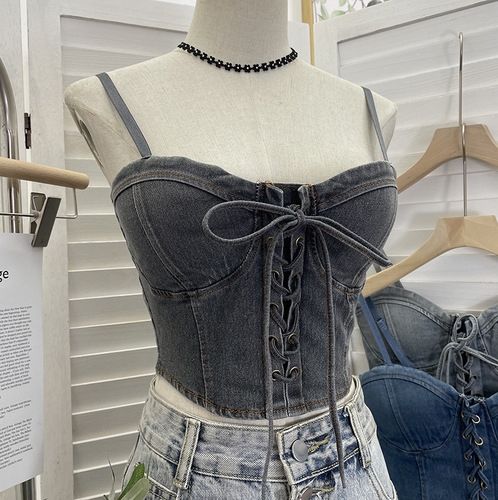 Actual shot of a denim vest with chest pads, adjustable shoulder straps, and a bow tie short suspender tube top 2597