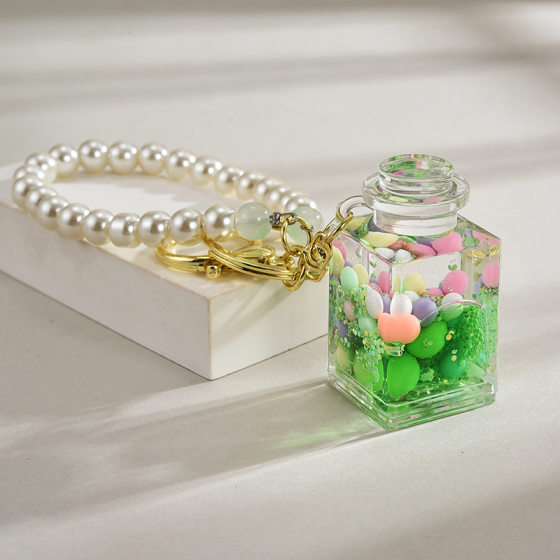 Online celebrity quicksand bottle creative handmade beaded quicksand bottle pendant oil keychain pendant bag accessories wholesale