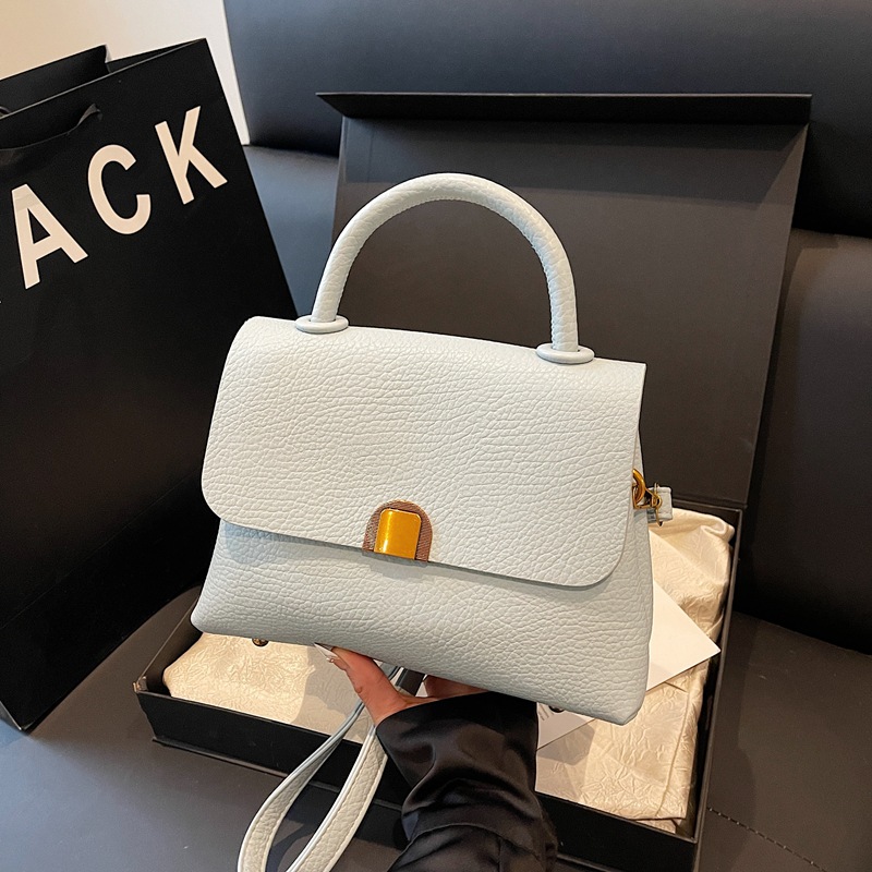 Bolso de moda coreano 2025 verano nuevo bolso femenino casual con patrón de lichi bolso de hombro simple bolso de mensajero de viaje