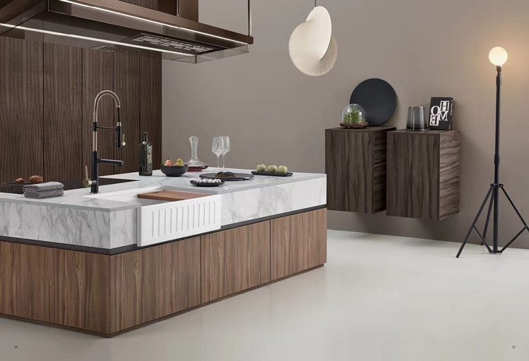 The contemporary all-copper cold and hot single handle island kitchen from Germany features a magnetic sink for washing vegetables, a pull-out flower shower, and a rotatable faucet full figure