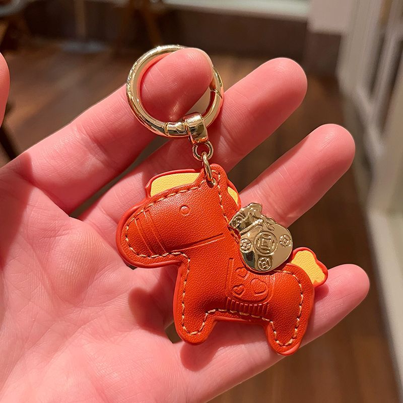 すぐにお金のあるキーホルダーの創意的な個性が精巧で、男女カップルのペンダントが可愛いです。|undefined