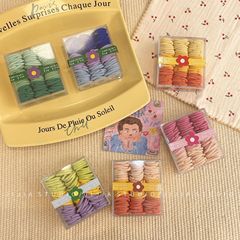 90本は虹色の小さい皮の筋をつけて高弾力で髪のゴムの子供を傷つけません。