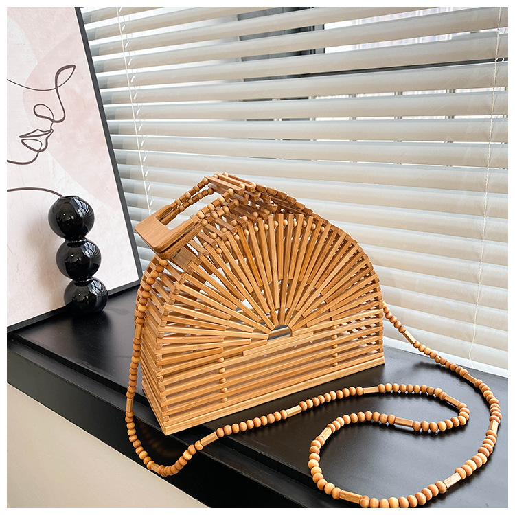 Women's Medium Bamboo Weaving Solid Color Vacation Classic Style Hollow Semicircle Magnetic Buckle Crossbody Bag display picture 2