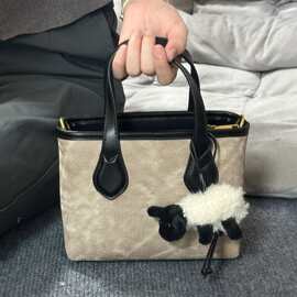 手提水桶包包女时尚新款复古秋冬流行菜篮子包高级质感单肩斜挎包