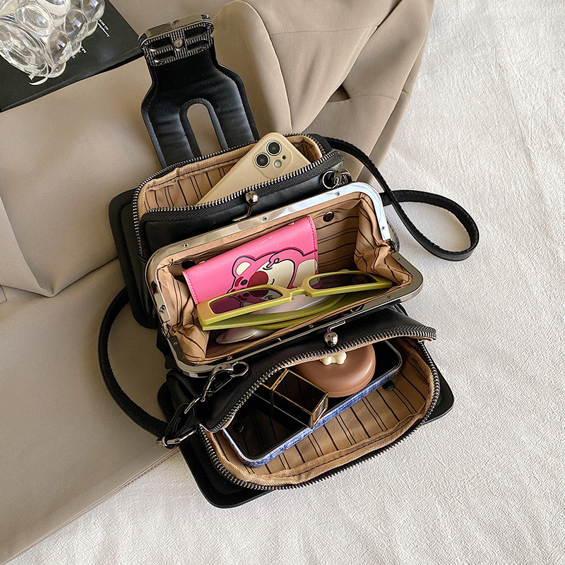 Bolso de mano de lujo retro luz 2024 nueva moda versátil bolso de hombro de mujer relieve dibujado a mano bolso de tres capas