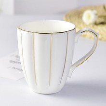 厂家批发骨瓷马克杯  创意手工描金南瓜奶杯陶瓷办公礼品广告杯