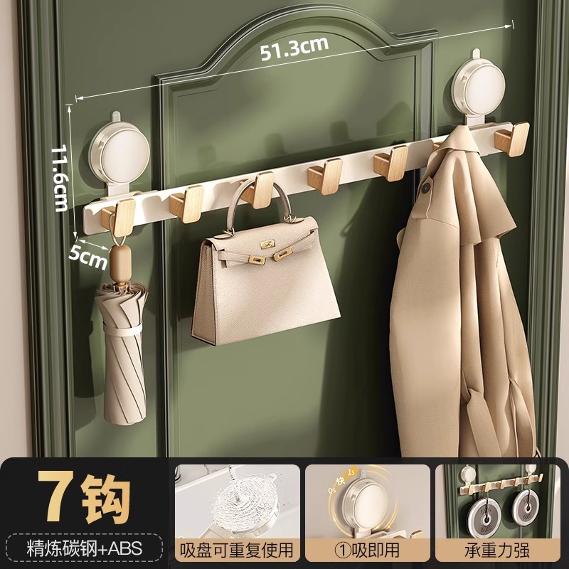 Gancho de ventosa detrás de la puerta una fila de agujeros sin perforación fuerte portante de carga en el área de percha de ropa colgada por el portal en la puerta de entrada de almacenamiento de estantes