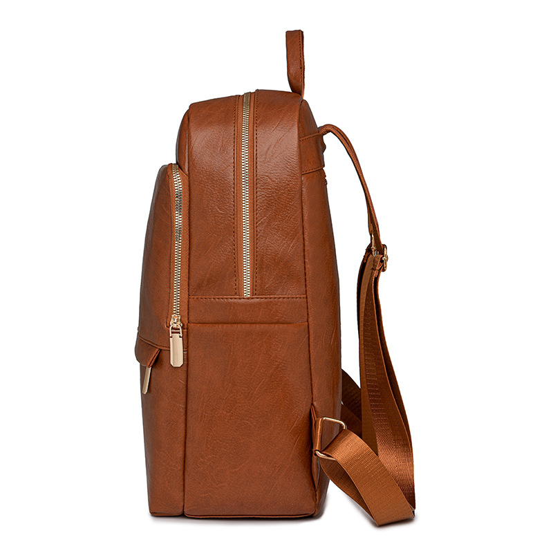 2024 nueva mochila de cuero suave para mujer casual moda retro urbano viaje mochila escolar para estudiantes marea