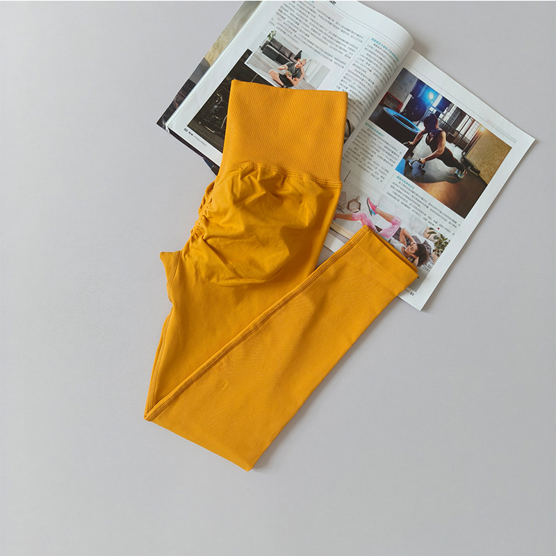 Pantalones de gimnasio sin costura europeos y estadounidenses, cintura alta, abdomen, caderas, pantalones de melocotón para correr, yoga, leggings apretadas