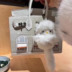 可爱奶糯糯长尾巴毛绒包包书包挂饰品高端包挂hellokitty挂件