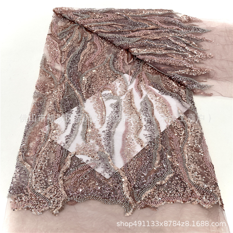 Tubo de perlas bordado sequinilla tela tela de malla de encaje industria pesada moda transfronteriza tela de vestido de boda