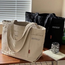 原创设计日韩文艺通勤加厚帆布单肩简约休闲百搭学生大容量托特包