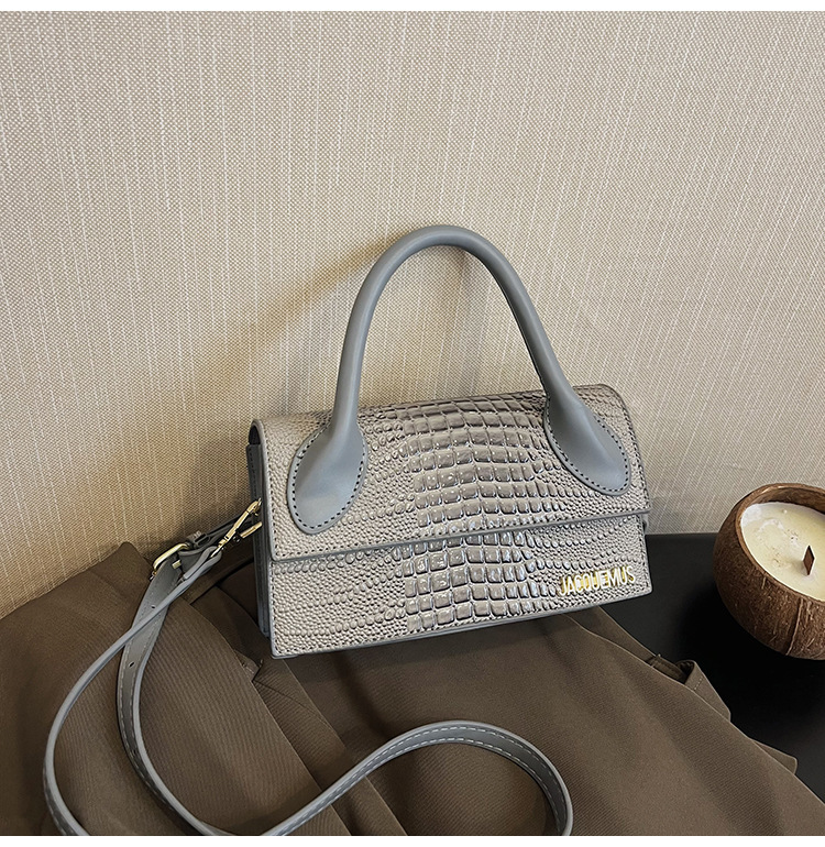 Bolso de moda de estilo occidental europeo y americano 2024 nuevo bolso de hombro retro de tendencia salvaje bolso de mensajero de textura simple