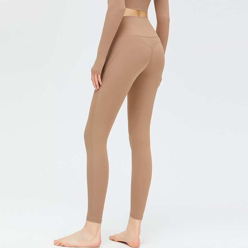 Nueva Cruz cintura fitness pantalones melocotón levantamiento de la cadera Pantalones deportivos mujeres cintura alta vientre contratación sin T línea nude yoga Pantalones