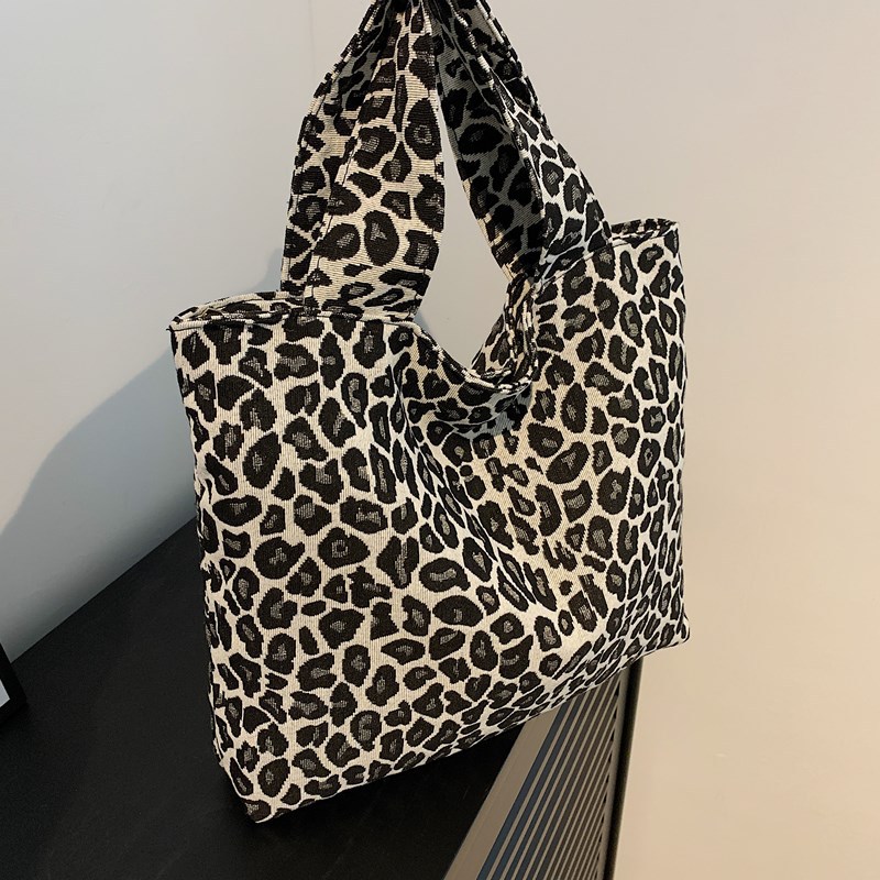 Bolsa de lona de leopardo para mujeres 2024 nuevo otoño y invierno ocio versátil mochila de hombro de viaje tote