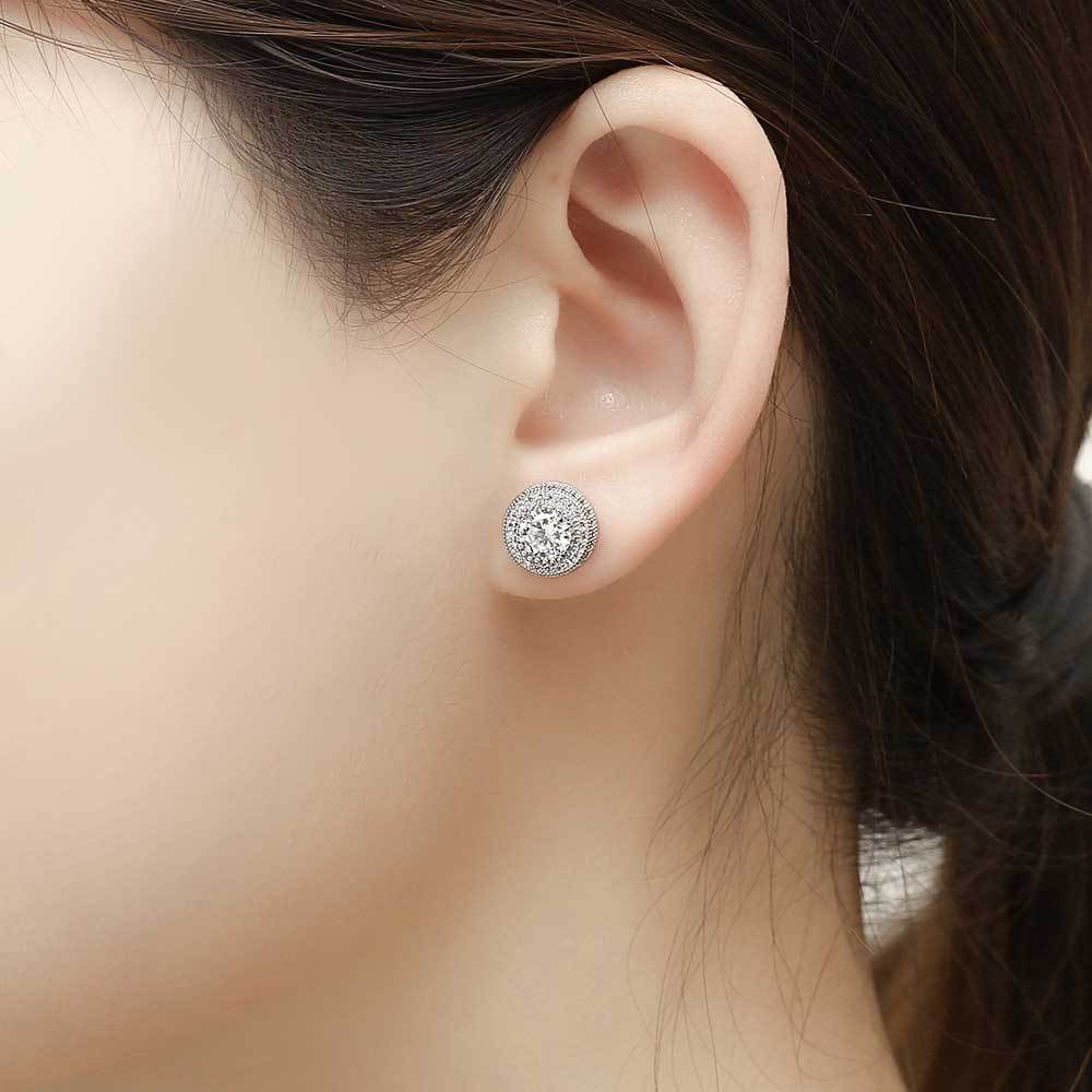 Simple Style Round Copper Inlaid Zircon Ear Studs display picture 1