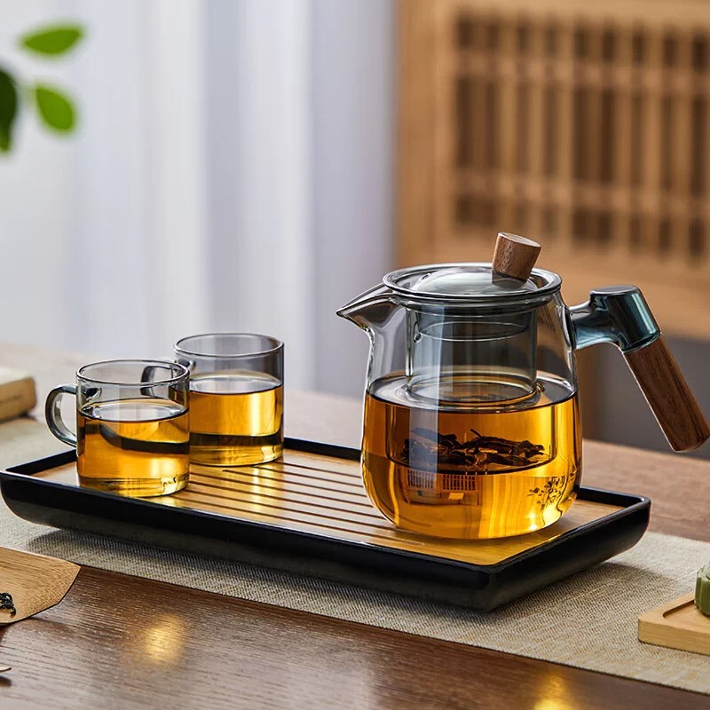 Thickened, heat-resistant glass teapot for home use, 2026 new model, with a filter for brewing floral teas, and a design that separates tea leaves from the water Thickened, heat-resistant glass teapot for home use, 2026 new model, with a filter for brewing floral teas, and a design that separates tea leaves from the water