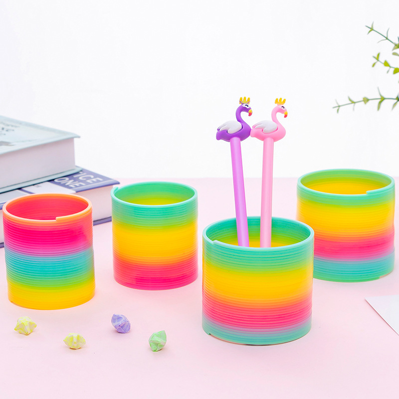 Anillo mágico de arco iris para niños juguete de inteligencia jengle anillo elástico luminoso para niños y niñas regalo colorido anillo de primavera