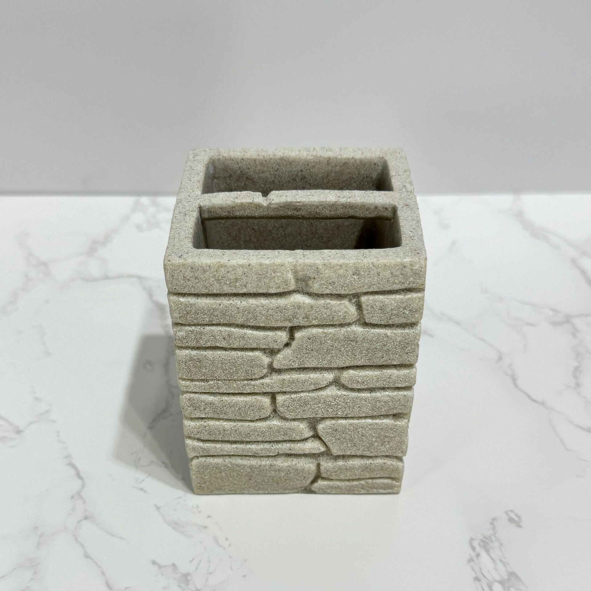 Imitación de diseño de arena y grava, baño de cuatro piezas, juego de decoración de baño de hotel de estilo europeo, botella de desinfectante de manos transfronterizo