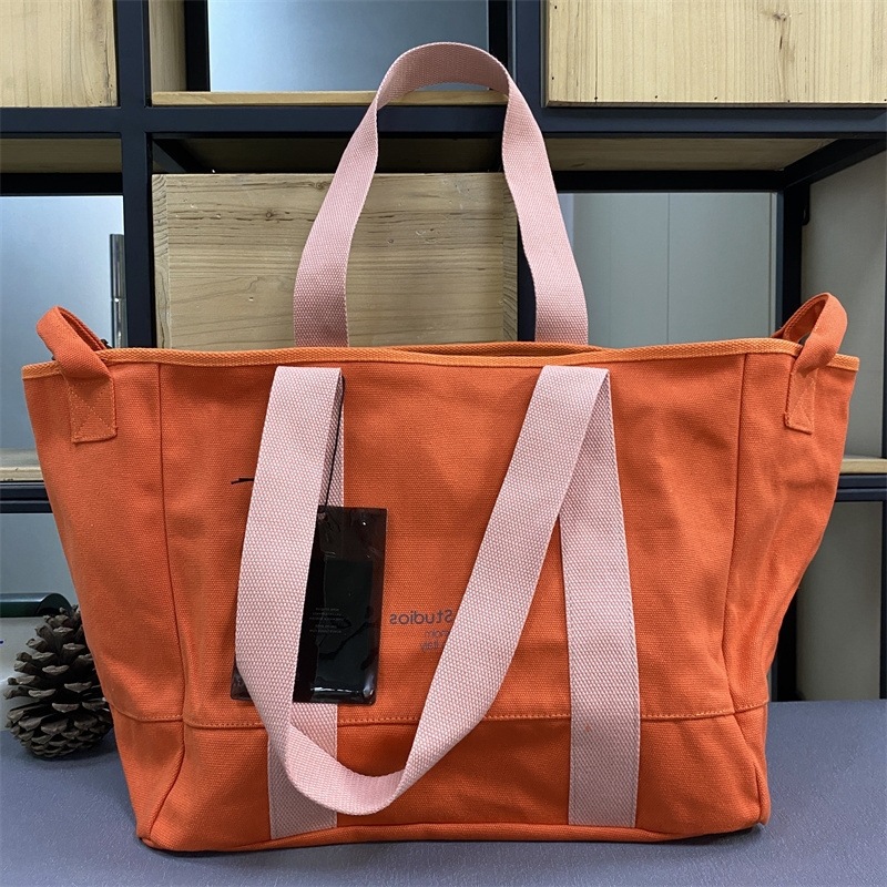 跨境热销潮流时尚日本韩国ac大容量休闲帆布包购物袋男女手提袋