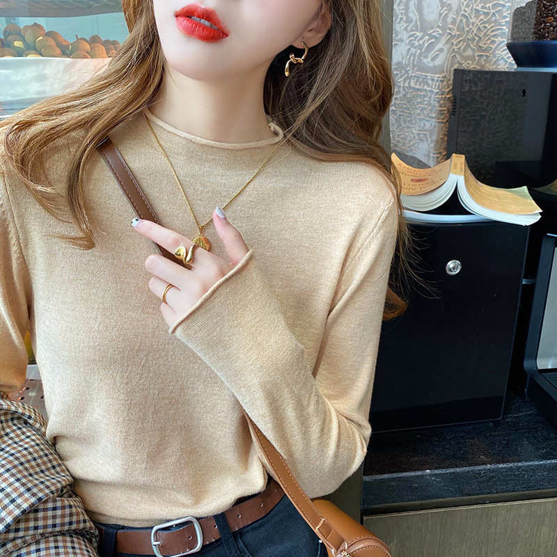韓国版秋冬半高襟のニットの女性の薄いタイプの洋風の新型の中にセーターの長袖の上着を掛けて外に着ます。|undefined