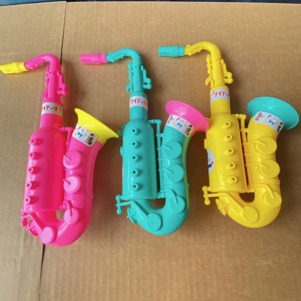 Детская игрушка труба саксофон музыкальный инструмент оптом свистящий музыкальный инструмент детский сад стойло кольцо фестиваль