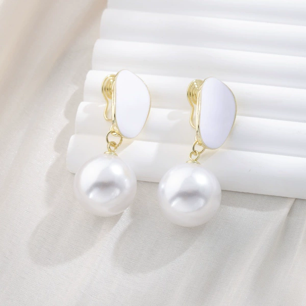 White mosquito coil from pearl, ear clips