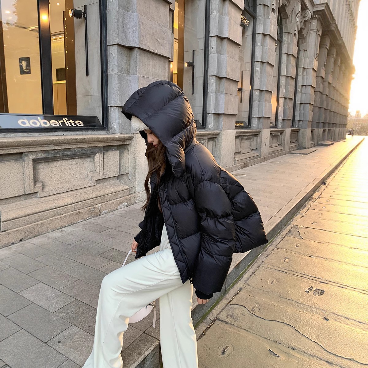 Comercio exterior transfronterizo invierno nuevo tipo de ropa de algodón de pluma de mujer engrosada moda coreana de diseño relajado sensación de ropa de pan casual