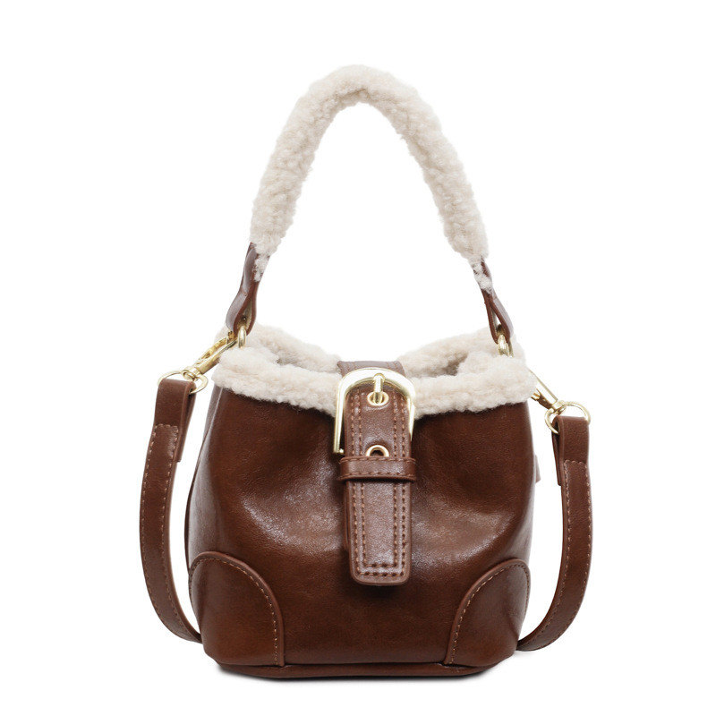 Cordero MINI bolso de cubo de mano retro bolso de peluche de color para mujeres 2025 invierno nuevo mochila de hombro