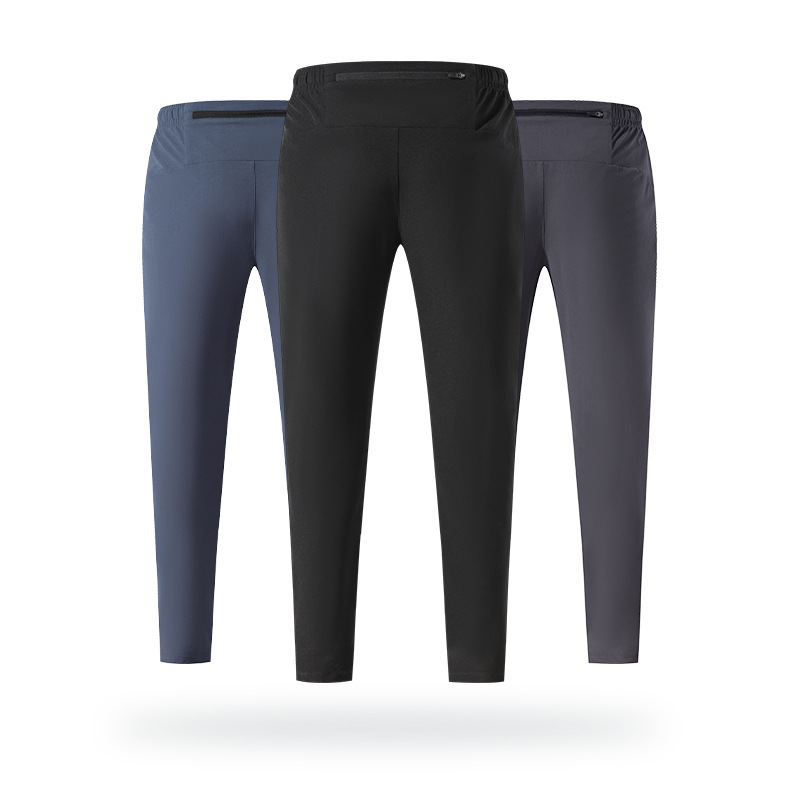 Pantalones deportivos al aire libre Otoño e Invierno hombres corriendo fitness pantalones de secado rápido sueltos transpirables deportes casuales pantalones de entrenamiento de secado rápido