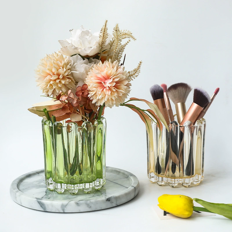 Brush, eyebrow pencil, pens holder, glass decorations, table storage system