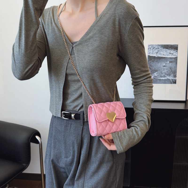 Versión coreana del bolso de hombro para niña con fragancia pequeña dulce amor estilo occidental Lingge baby bandolera nuevo bolso de cadena para niños