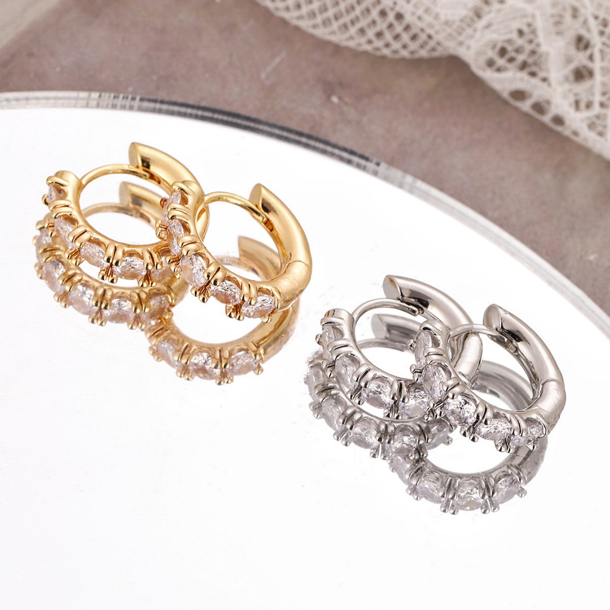 Amazon nuevo aretes de círculo geométrico temperamento simple aire frío zircon bronce aretes de diseño de nicho