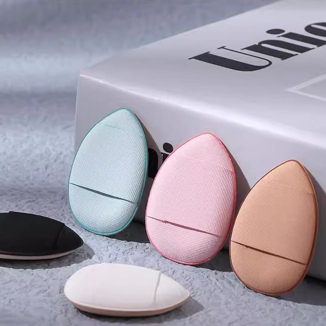 Cojín de tamaño de pulgar para fijar el maquillaje en las puntas de los dedos, disimulando parcialmente las imperfecciones, detalle de dedos en forma de pantuflas pequeñas, herramienta de maquillaje para el maquillaje en las puntas de los dedos.